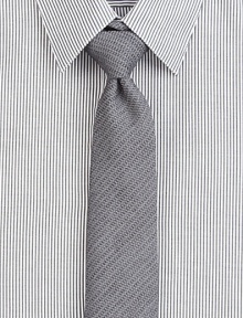 Solid silk blend tie with subtle textured stripe pattern.About 2½ wide36% viscose/29% silk/21% wool/14% mohairDry cleanMade in USA of Italian fabric Solid silk blend tie with subtle textured stripe pattern.About 2½ wide36% viscose/29% silk/21% wool/14% mohairDry cleanMade in USA of Italian fabric