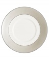 Set a dazzling tea or coffee service with this fine china saucer. From innovative designer Monique Lhullier's collection of dinnerware and dishes, it features a pearlescent border with glossy raised dots and a fine stitch-like pattern.