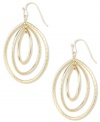 Opulence in oval. Triple ovals make a chic statement on these small drop earrings from Anne Klein. Crafted in a gold tone mixed metal. Approximate drop: 2 inches.