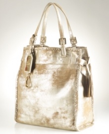 Give a luxe look to your everyday accessorizing with this chic, metallic suede tote from Lauren Ralph Lauren. Golden buckles adorn the slender straps, while laced detail stitching, signature hardware and flirty side tassels add extra allure. Give a luxe look to your everyday accessorizing with this chic, metallic suede tote from Lauren Ralph Lauren. Golden buckles adorn the slender straps, while laced detail stitching, signature hardware and flirty side tassels add extra allure.