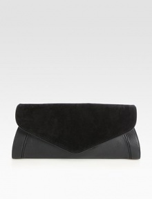 Ultra-touchable suede combines with leather in this flap-top design, imparting thoughts of refined elegance. Snap flap closureOne inside zip pocketCotton lining15W X 6¾H X 1½DImported Ultra-touchable suede combines with leather in this flap-top design, imparting thoughts of refined elegance. Snap flap closureOne inside zip pocketCotton lining15W X 6¾H X 1½DImported