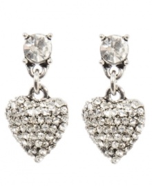 Have a heart. Reveal your romantic side with Betsey Johnson's dazzling heart-shaped drop earrings that say Love Me in back. Bedecked with sparkling crystals throughout, they're set in silver tone mixed metal. Approximate drop: 1 inch.