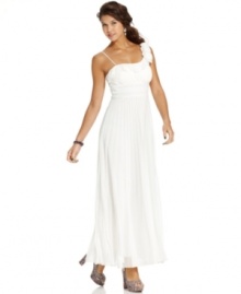 Glam gown alert! Step out in this elegant empire dress from Speechless featuring lovely long pleats, a one-shoulder design and cute rosettes. Glam gown alert! Step out in this elegant empire dress from Speechless featuring lovely long pleats, a one-shoulder design and cute rosettes.