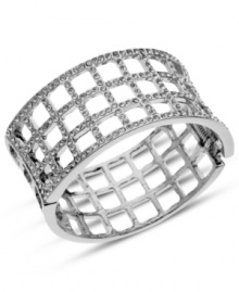 Fierce fashion from GUESS. This hinged cuff bracelet features a checkered design embellished with crystal accents. Crafted from imitation rhodium tone mixed metal. Approximate diameter: 2-1/2 inches. Fierce fashion from GUESS. This hinged cuff bracelet features a checkered design embellished with crystal accents. Crafted from imitation rhodium tone mixed metal. Approximate diameter: 2-1/2 inches.