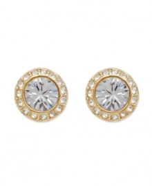 For a look that shines, yet subtle enough for every day style. Swarovski's chic, circle studs feature a round-cut crystal center stone surrounded by sparkling crystal edges. Crafted in gold tone mixed metal. Approximate diameter: 1/3 inches.