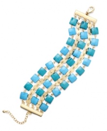 A tropical infusion. Charter Club's trendy bracelet will spice practically any look up with its three-row design and bright blue epoxy beads. Crafted in gold tone mixed metal. Approximate length: 7 inches + 2-inch extender.