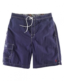 Relaxed-fitting swim trunk in quick-drying nylon. Relaxed-fitting swim trunk in quick-drying nylon.