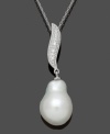 Like a shimmering piece of artwork, Belle de Mer's Baroque-style pendant will captivate. Crafted in 14k white gold, pendant highlights a cultured freshwater pearl (11-12 mm) and a stylish, swirling bail dusted with diamond accents. Approximate length: 18 inches. Approximate drop: 1-1/4 inches.