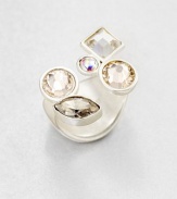 Wear this reversible ring with the multi-sized, multi-shaped crystals on top, or spin it around so all that shows is its wide, smooth silvery band.CrystalSilvertone-finished brassMade in Italy