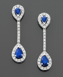 These luxurious drop earrings make a glam statement. Teardrop-cut sapphires (9/10 ct. t.w.) and round-cut diamonds (1/3 ct. t.w.) are set in 14k white gold. Drop measures 1-1/4 inches. These luxurious drop earrings make a glam statement. Teardrop-cut sapphires (9/10 ct. t.w.) and round-cut diamonds (1/3 ct. t.w.) are set in 14k white gold. Drop measures 1-1/4 inches.