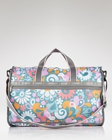 Cooly blending practical design with a fashionable feel, LeSportsac' roomy nylon duffel makes a smart travel companion. Cooly blending practical design with a fashionable feel, LeSportsac' roomy nylon duffel makes a smart travel companion.