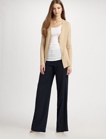 Lengthy, ribbed essential with a v-neck, button front and touch of cashmere. V-neckButton frontLong sleevesLonger length hits below the hips40% rayon/30% nylon/25% polyester/5% cashmereDry cleanImportedModel shown is 5'11 (180cm) wearing US size Small.