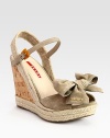 Suede upper with an espadrille slingback, cork wedge and bow detail. Cork and hemp wedge, 4 (100mm)Hemp platform, 1 (25mm)Compares to a 3 heel (75mm)Suede upperLeather liningRubber solePadded insoleImportedOUR FIT MODEL RECOMMENDS ordering true size. 