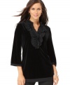 Rich velvet and ruffles combine for a fashion-forward look with this Alfani tunic -- perfect for the season's festivities!