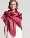 A chic two-tone square scarf with large signature emblem print.