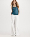 Low-key sheer linen in a simple style for warm days.Scoop neckline Ribbed trim Linen/spandex Dry clean Imported