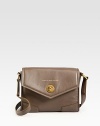 EXCLUSIVELY AT SAKS. An elegantly structured bag of smooth leather, with just enough room for your essentials. Adjustable shoulder strap, 18-21½ dropTurn-lock front flap closureOne outside open pocketOne inside zip pocketTwo inside open pocketsLogo-print lining4W X 9½H X 12½DImported