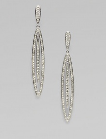 EXCLUSIVELY AT SAKS. A stunning style featuring an elongated oval accented with brilliant pavé crystals. CrystalsRhodium-plated brassDrop, about 2½Post backImported 