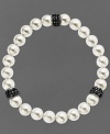 Slip a little elegance over your wrist. Kaleidoscope's pretty bracelet features a mix of cultured freshwater pearls (8 mm) and sparkling stations made from black crystals with Swarovski Elements. Bracelet stretches to fit wrist. Approximate length: 7-1/2 inches.