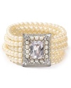 Make statement jewelry your signature. Elegant yet easy-to-wear, Carolee's ornate pearl and crystal cuff bracelet adds heirloom impact.