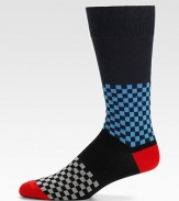 Soft and stretchy in a superior cotton knit with check patterns and contrast color at the toe and heel. Mid-calf height 80% cotton/20% polyamide Machine wash Made in Italy 