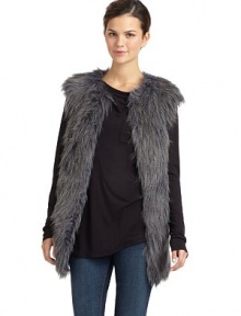 THE LOOKVariegated faux fur design Round necklineFront fur hook closuresSleevelessSeam pocketsTHE FITAbout 29 from shoulder to hemTHE MATERIALPolyester/acrylicCARE & ORIGINDry cleanImportedModel shown is 5'10 (177cm) wearing US size Small. THE LOOKVariegated faux fur design Round necklineFront fur hook closuresSleevelessSeam pocketsTHE FITAbout 29 from shoulder to hemTHE MATERIALPolyester/acrylicCARE & ORIGINDry cleanImportedModel shown is 5'10 (177cm) wearing US size Small.