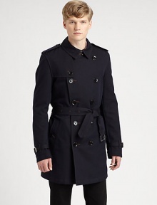 A signature double-breasted trench is structured in a sleek, rain-resistant cotton-wool blend with military-inspired epaulettes, belt-and-button detail behind the collar and a removable warmer for added warmth and versatility.Button-frontShoulder epaulettesHip slash pocketsBelted waistRear ventAbout 35 from shoulder to hem54% cotton/23% virgin wool/23% acrylicDry cleanImportedThis style runs true to size. A signature double-breasted trench is structured in a sleek, rain-resistant cotton-wool blend with military-inspired epaulettes, belt-and-button detail behind the collar and a removable warmer for added warmth and versatility.Button-frontShoulder epaulettesHip slash pocketsBelted waistRear ventAbout 35 from shoulder to hem54% cotton/23% virgin wool/23% acrylicDry cleanImportedThis style runs true to size.