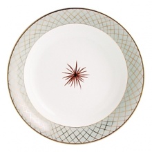 From Bernardaud, jewel-like shapes inspired by the 1940's and an exuberant design imbue this dinnerware pattern with a baroque and precious quality. Etoiles's bold styling offers a new interior aesthetic full of whimsy. From Bernardaud, jewel-like shapes inspired by the 1940's and an exuberant design imbue this dinnerware pattern with a baroque and precious quality. Etoiles's bold styling offers a new interior aesthetic full of whimsy.