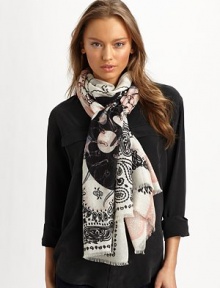 A luxurious blend of silk and cashmere with a fun skull and paisley print. 50% silk/50% cashmereAbout 28 X 80Dry cleanImported A luxurious blend of silk and cashmere with a fun skull and paisley print. 50% silk/50% cashmereAbout 28 X 80Dry cleanImported
