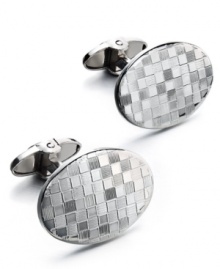 The perfect gift for the sophisticated business man. These sleek oval-shaped cuff links feature a unique checkered design in sterling silver. Approximate length: 1-7/8 inches. Approximate width: 5/8 inch. The perfect gift for the sophisticated business man. These sleek oval-shaped cuff links feature a unique checkered design in sterling silver. Approximate length: 1-7/8 inches. Approximate width: 5/8 inch.