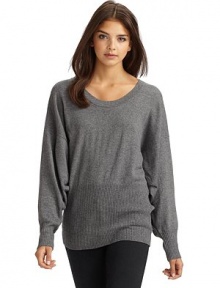 THE LOOKScoop necklineLong dolman sleeves with ribbed cuffsRibbed hemHorizontal snap placket across the backTHE FITAbout 28 from shoulder to hemTHE MATERIAL70% wool/30% cashmereCARE & ORIGINDry cleanImported