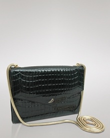 Take after hours into exotic overdrive with Tusk's croc-embossed clutch. The chain-clad compact shines all night, so pair it with a cocktail frock and booties for lasting soirée chic. Take after hours into exotic overdrive with Tusk's croc-embossed clutch. The chain-clad compact shines all night, so pair it with a cocktail frock and booties for lasting soirée chic.