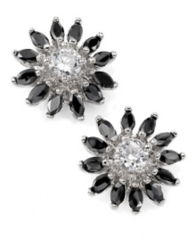 Pull out all the stops with sparkling flower studs in vintage style. City by City earrings feature glistening, jet black cubic zirconia petals with a clear cubic zirconia center (5-1/4 ct. t.w.). Crafted in silver tone mixed metal. Pull out all the stops with sparkling flower studs in vintage style. City by City earrings feature glistening, jet black cubic zirconia petals with a clear cubic zirconia center (5-1/4 ct. t.w.). Crafted in silver tone mixed metal.