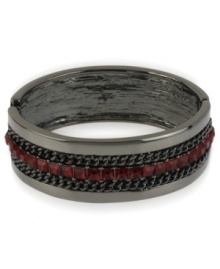 Kenneth Cole New York looks to set off a chain reaction with this bangle bracelet. Crafted from hematite-tone mixed metal, the bracelet has red beads and a chain around it for post-modern appeal. Approximate diameter: 2-3/8 inches.