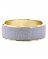 Look great in lilac. A pretty pastel purple hue goes glam on this glitter cuff bracelet from Betsey Johnson. Crafted in gold tone mixed metal, it includes a hinge closure. Approximate length: 8 inches. Approximate width: 8/10 inch.