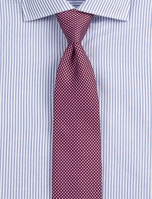 A silk dress essential is patterned with an array of small dots, lending a vibrant, modern update to a wardrobe classic.About 3 wideSilkDry cleanMade in Italy A silk dress essential is patterned with an array of small dots, lending a vibrant, modern update to a wardrobe classic.About 3 wideSilkDry cleanMade in Italy