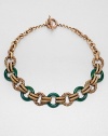 An intricately engraved bronze and stunning green agate chain link design inspired by the designer's love of nature's bounty. BronzeGreen agateLength, about 19.5Toggle closureMade in USA