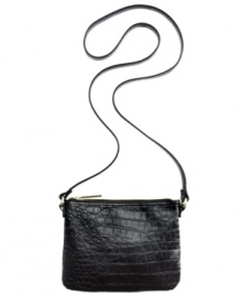 Play up your chic side with this petite design from BCBGeneration that's big on style. Edgy croc-embossed faux leather and signature hardware add some urban cool, while the slender crossbody strap offers instant versatility. Play up your chic side with this petite design from BCBGeneration that's big on style. Edgy croc-embossed faux leather and signature hardware add some urban cool, while the slender crossbody strap offers instant versatility.