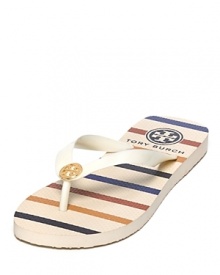 Slim stripes and a gleaming Tory Burch logo take the beach classic to the boardwalk and beyond.