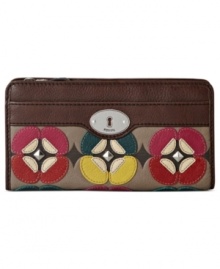 Fossil gives a nod to '70s flower power fashion with this irresistible applique clutch. Rich leather is adorned with flirty floral accents, while the pocket-lined interior stows your stash without a worry. Fossil gives a nod to '70s flower power fashion with this irresistible applique clutch. Rich leather is adorned with flirty floral accents, while the pocket-lined interior stows your stash without a worry.