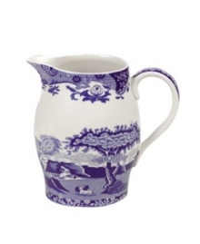 This classic Spode Blue Italian jug features the famous blue and white design framed by an Imari border, inspired by Chinese porcelain. This classic Spode Blue Italian jug features the famous blue and white design framed by an Imari border, inspired by Chinese porcelain.