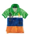 The classic polo shirt in breathable cotton mesh is updated with faded color-blocking and screen-printing.