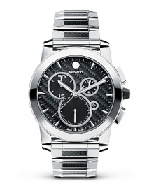 Movado's Vizio® chronograph watch has a striking architectural hinge-link bracelet in stainless steel/black carbon fiber. The solid stainless steel case has a tungsten carbide bezel. With a black carbon fiber dial and applied markers. Movado's Vizio® chronograph watch has a striking architectural hinge-link bracelet in stainless steel/black carbon fiber. The solid stainless steel case has a tungsten carbide bezel. With a black carbon fiber dial and applied markers.