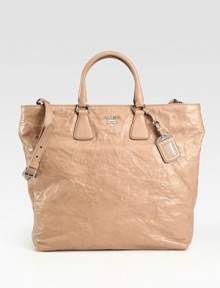 Rich leather in a roomy top-handle carryall finished with a logo detail.Double top handles, 5 dropRemovable, adjustable shoulder strap, 14½-17 dropTop snap closureOne inside zip pocketThree inside open pocketsLogo lining14W X 14H X 5DMade in Italy Rich leather in a roomy top-handle carryall finished with a logo detail.Double top handles, 5 dropRemovable, adjustable shoulder strap, 14½-17 dropTop snap closureOne inside zip pocketThree inside open pocketsLogo lining14W X 14H X 5DMade in Italy