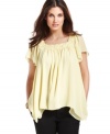 Origami pleats with embroidery add on-trend texture to this flowy Studio M A-line top!