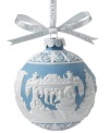 It's the night before Christmas and secretive Santa sneaks down the chimney in the finely embossed design of this Wedgwood ornament. In blue and white porcelain.