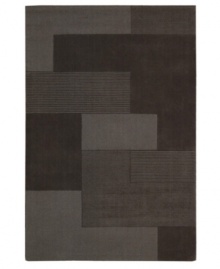 An abstract pattern makes a bold, modern statement upon this inviting Bowery area rug from Calvin Klein. Generously thick wool fibers are hand tufted in India for remarkable strength and detailed design.