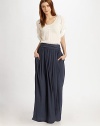 Softly-pleated jersey in a floor-sweeping silhouette.Wide, pleated waistbandSlash pocketsSide zipperAbout 41¾ longPolyesterDry cleanImported