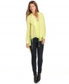 Draped details and a dramatic high-low hem up the edge on this BCBGMAXAZRIA chiffon blouse -- perfectly paired with skinny jeans for an urban-chic look!