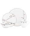 Hummingbirds twirl and buzz from flowery pink leaves to blue on this dreamy bone china cup from Lenox Lifestyle dinnerware. The dishes from the Silver Song collection are crisscrossed with platinum branches and abound with fanciful springtime delight and irresistible modern charm. Qualifies for Rebate